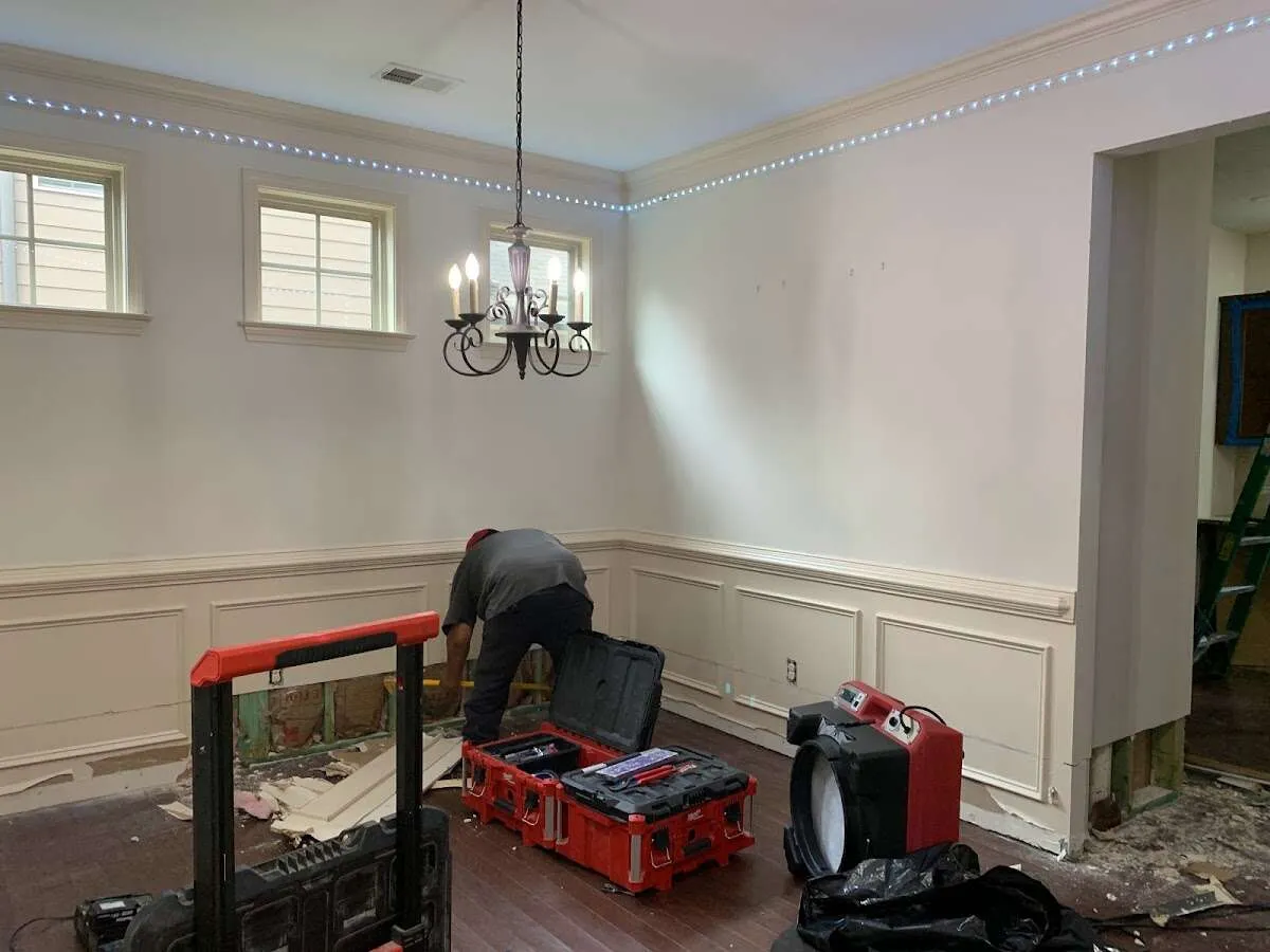 Restoration technician with professional equipment in Pembroke Pines